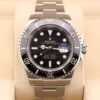 Black dial vintage diver watch with red accents
