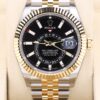 Two-tone Swiss automatic dress watch with black dial