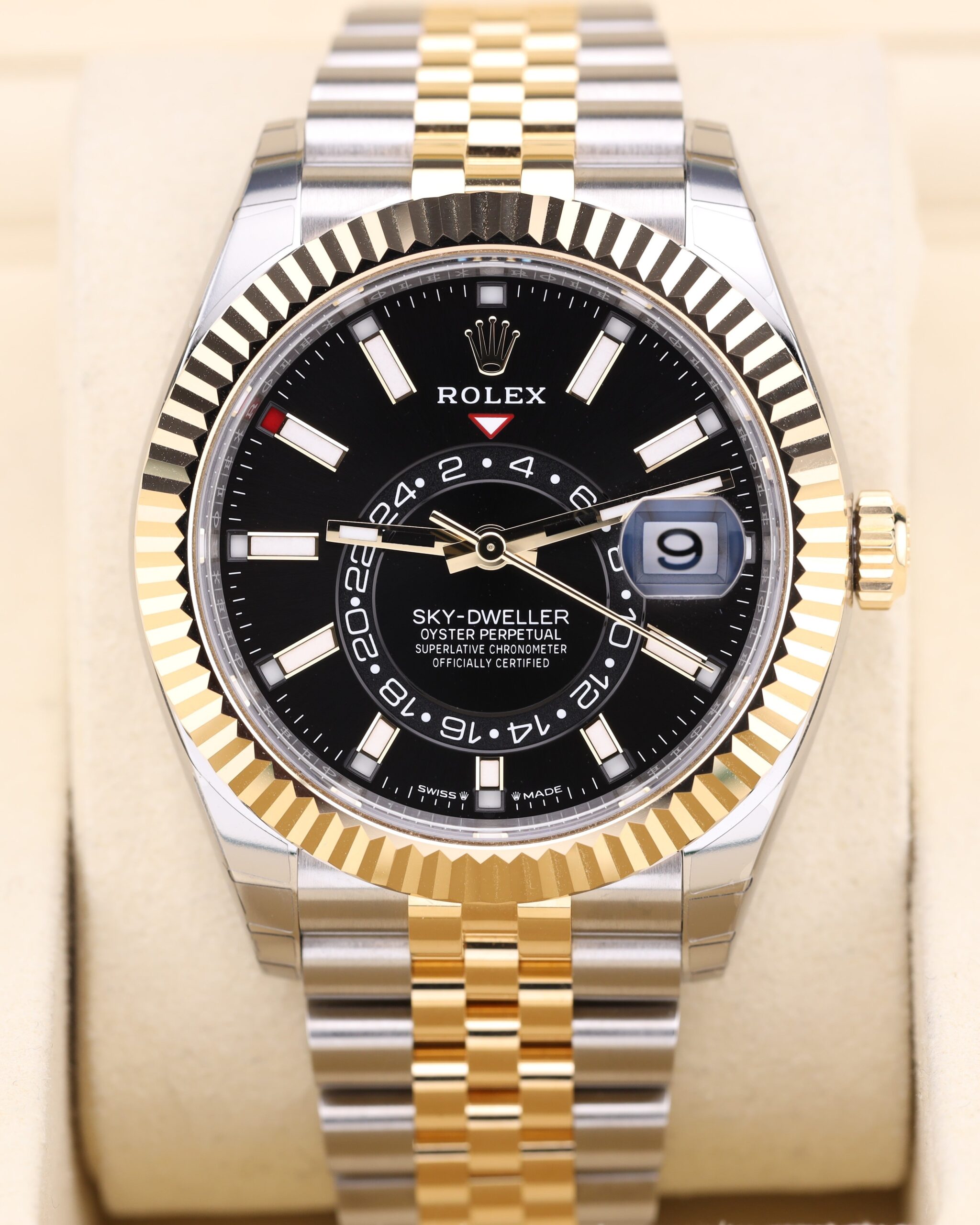 Two-tone Swiss automatic dress watch with black dial