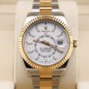 Two-tone automatic luxury wristwatch with white dial