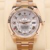 Luxury watch with pink Roman dial