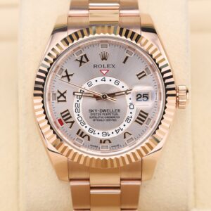Luxury watch with pink Roman dial
